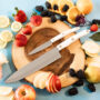 Cutco Knives with fruits and flowers