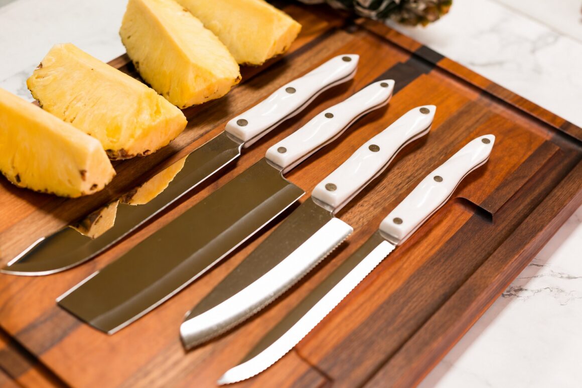 Cutco Knives on a Cutting Board