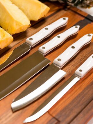 Cutco Knives on a Cutting Board