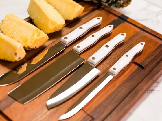 Cutco Knives on a Cutting Board