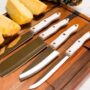Cutco Knives on a Cutting Board